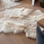 Off-white Icelandic sheepskin patchwork rug
